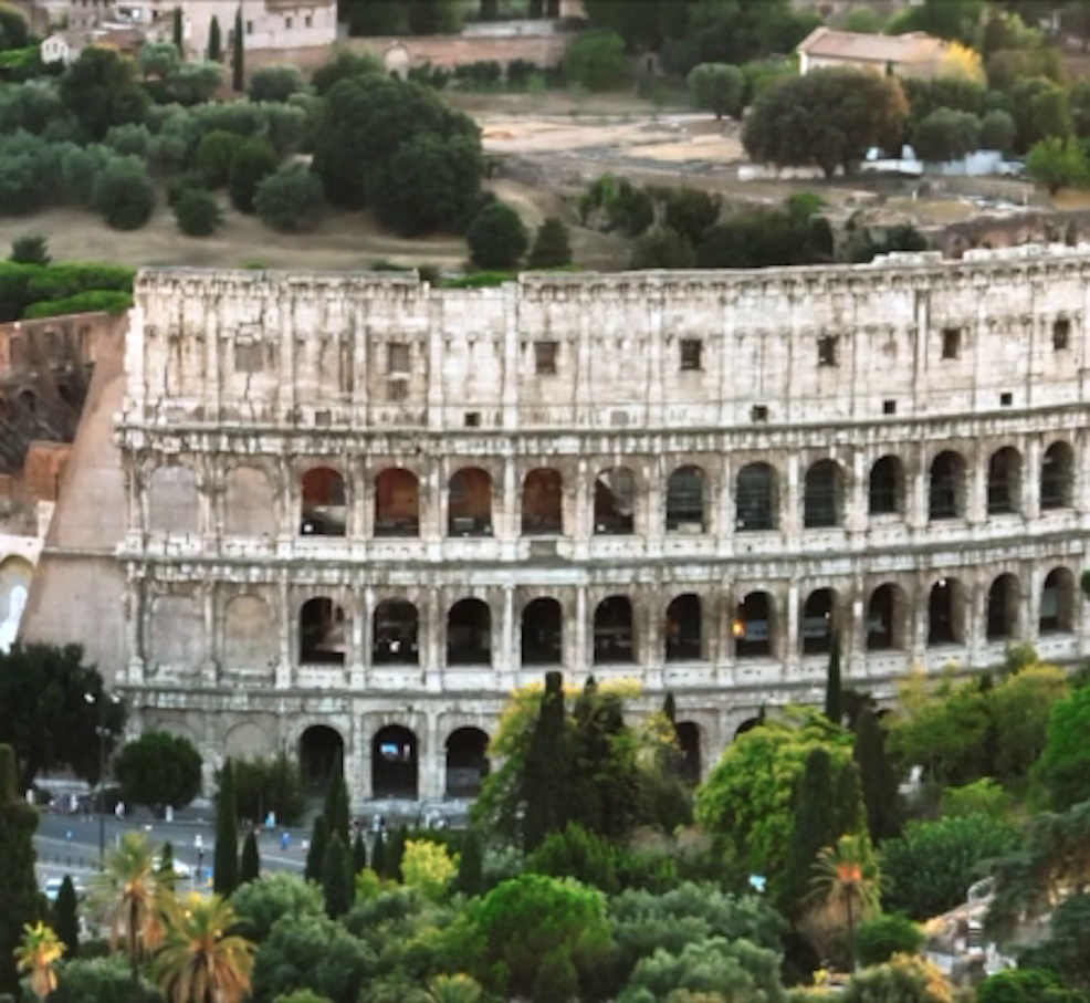 Panoramic view of Rome City showcasing famous landmarks like the Colosseum and the Roman Forum, ideal for a historical day trip.