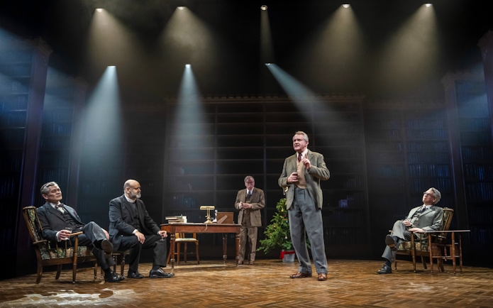 Stage scene from Shadowlands performance, West End, featuring actors in a library setting.