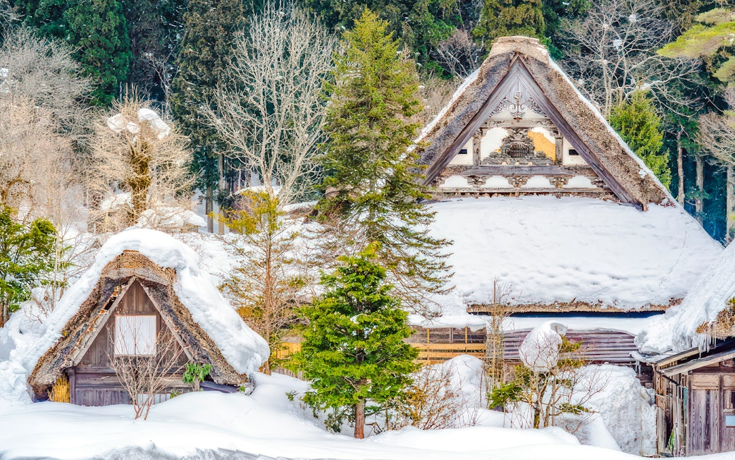 Traditional gassho-style houses in snow-covered Shirakawa-go village, Japan.