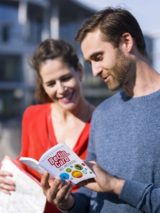 Blue Planet Aquarium entrance with visitors exploring marine exhibits.
