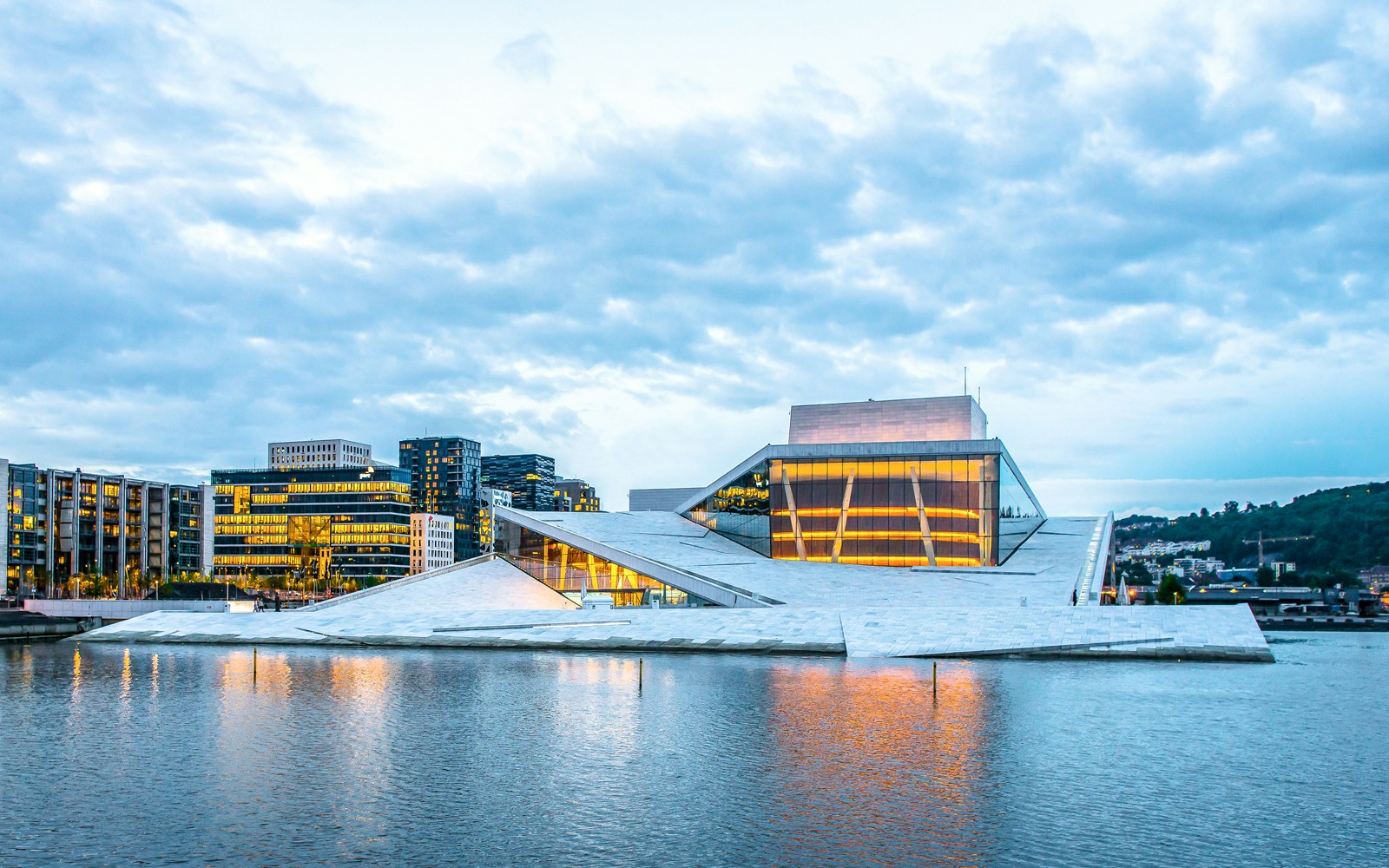Oslo Opera House with modern architecture by the waterfront in Norway.