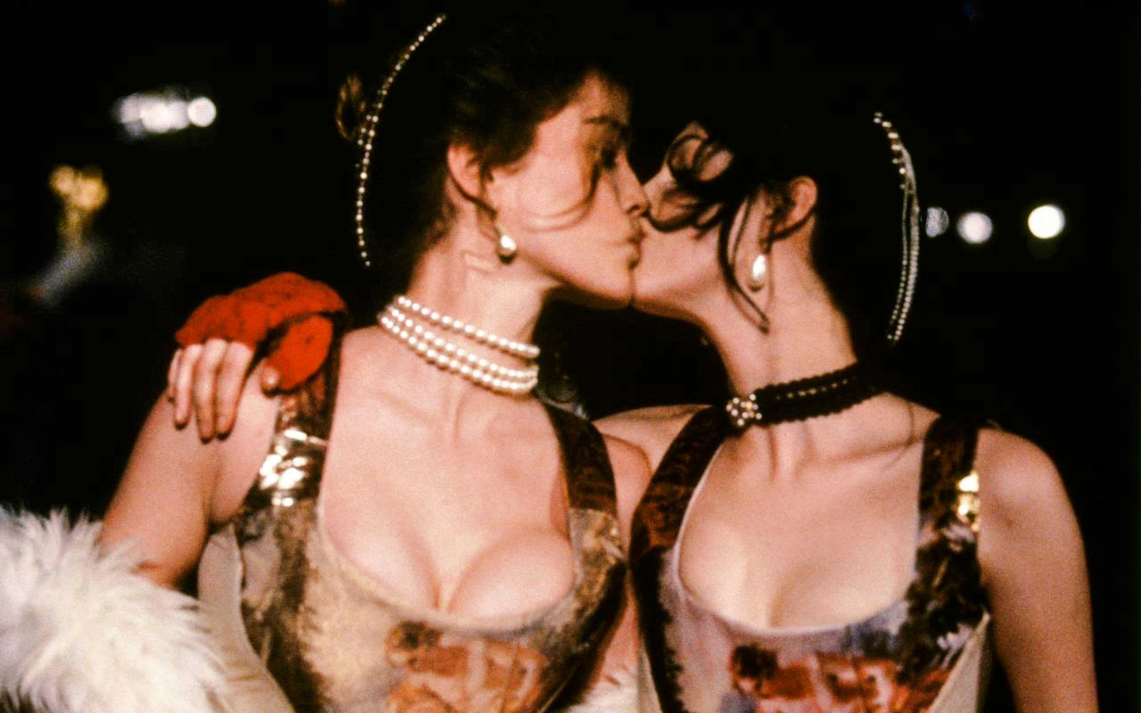 Two models in Vivienne Westwood dresses at the National Gallery of Victoria exhibition.