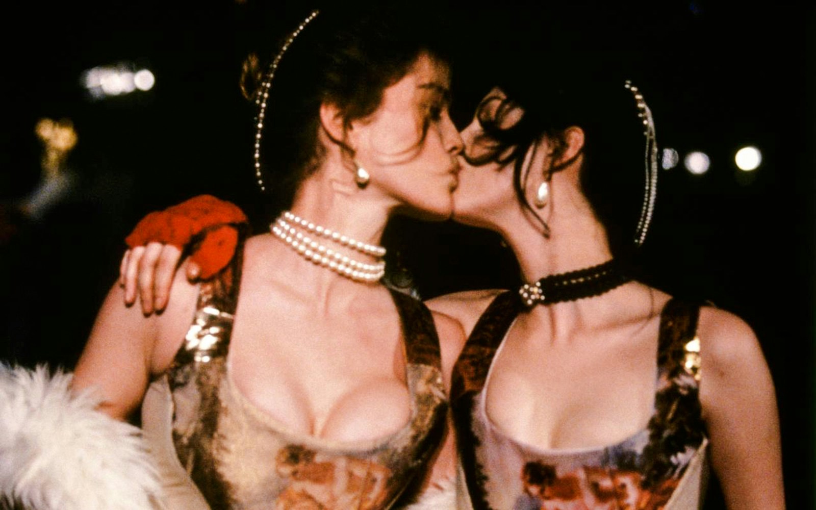 Two models in Vivienne Westwood dresses at the National Gallery of Victoria exhibition.