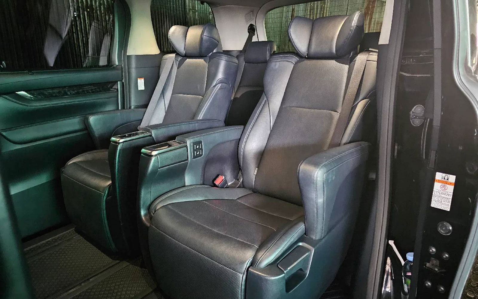 Premium leather captain seats in the private tour van for Doi Inthanon tour from Chiang Mai.
