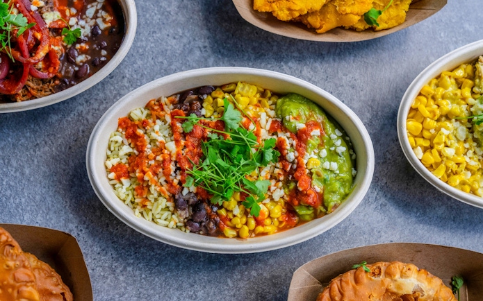 Bowl of rice, beans, corn, guacamole, and salsa at Busch Gardens Tampa Bay.