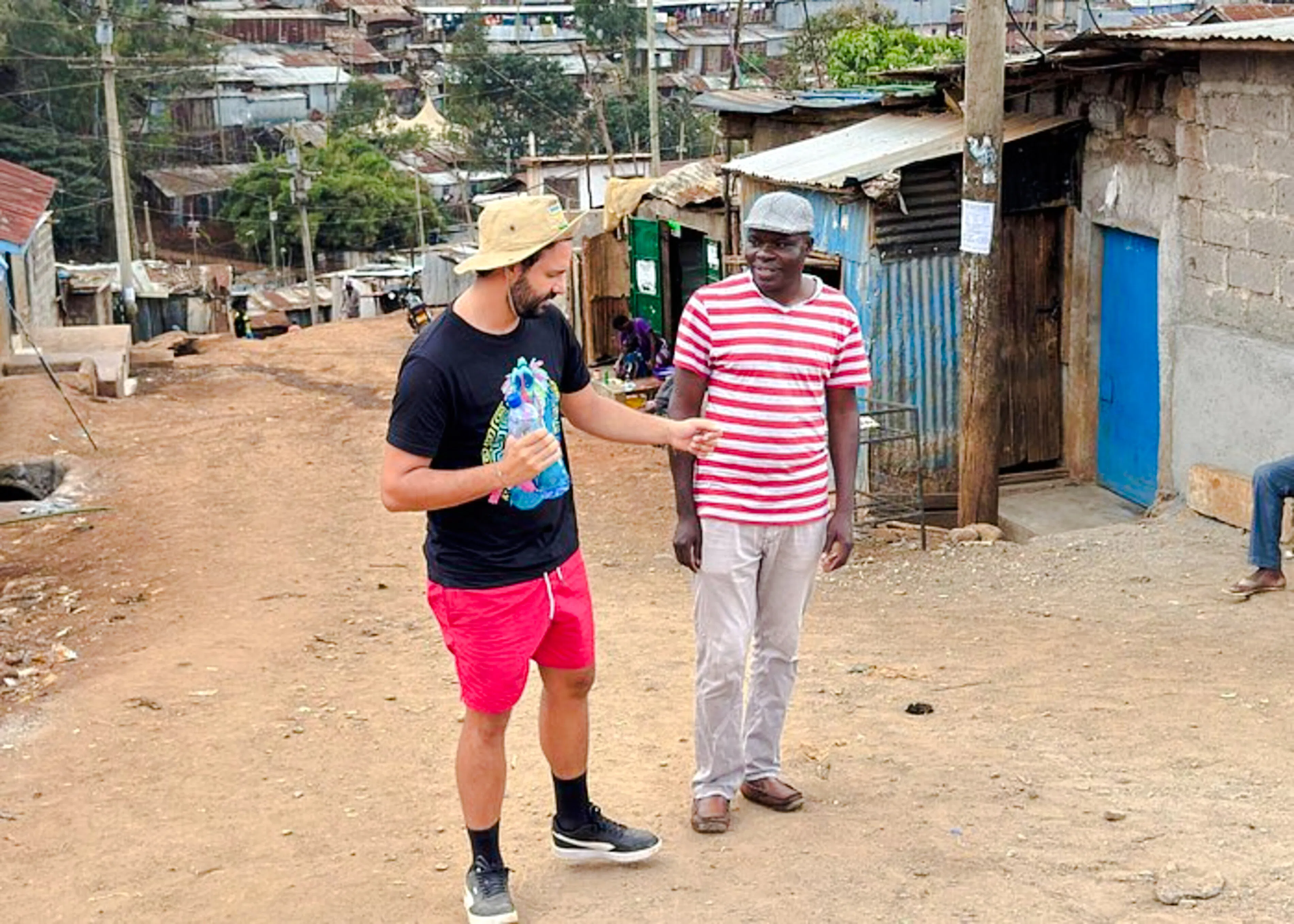 Guided walking tour in Kibera Slum, Nairobi, with local interaction.