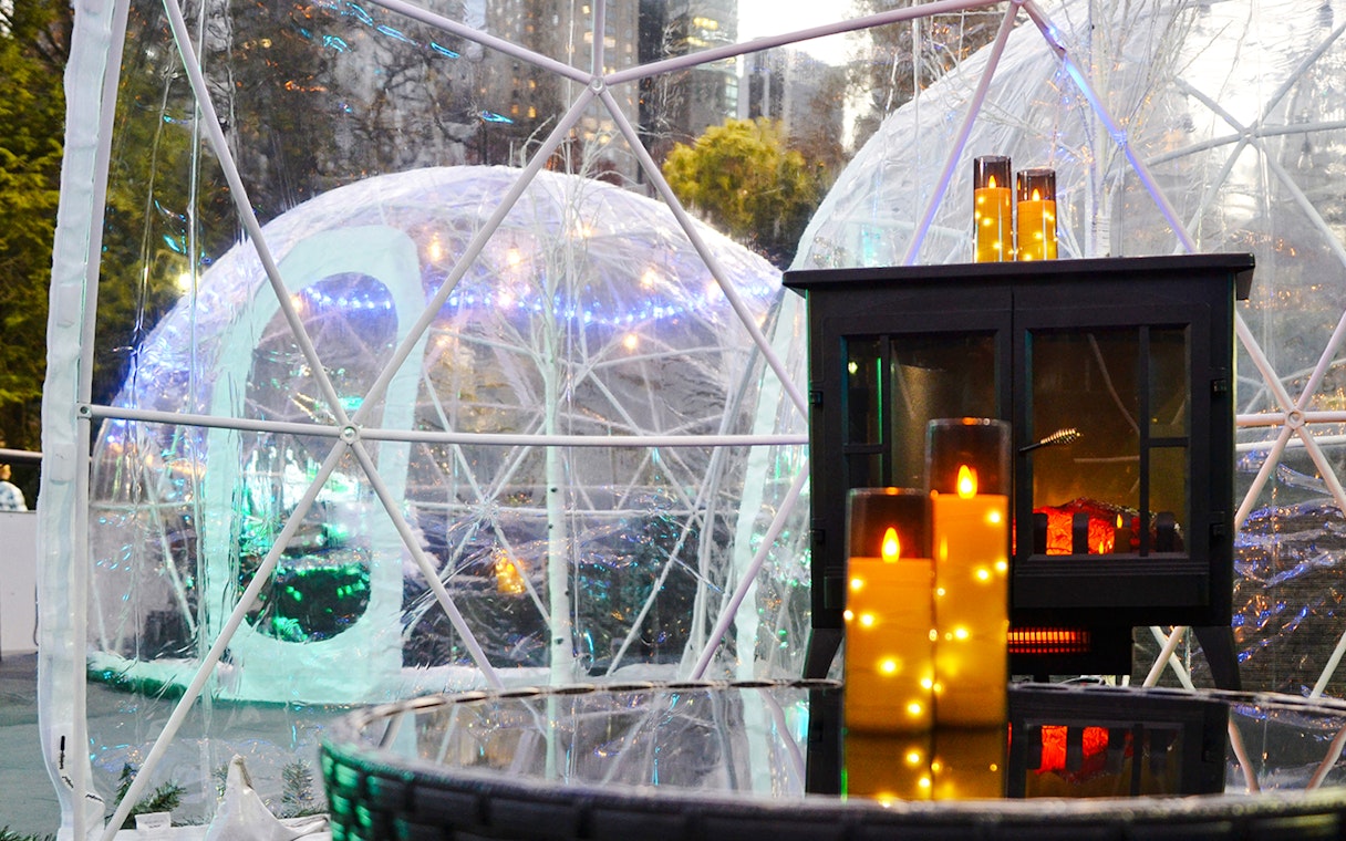 Igloos with lights and candles at Wollman ICE Rink, New York City.