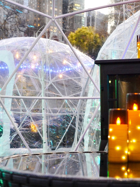 Igloos with lights and candles at Wollman ICE Rink, New York City.