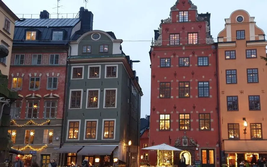 Colorful historic buildings in Stockholm's Gamla Stan during the Ghosts of Stockholm city exploration game.