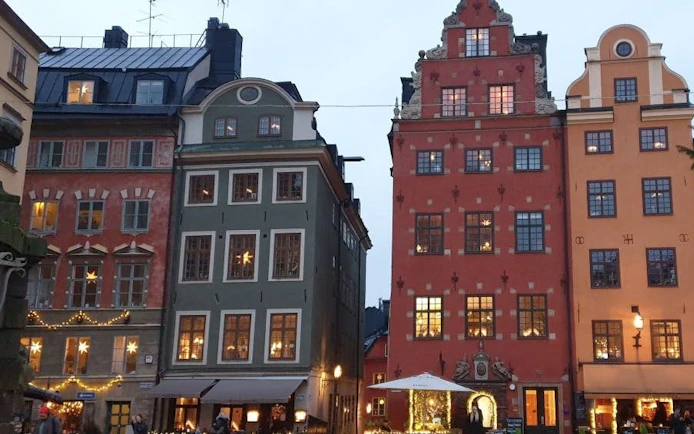 Colorful historic buildings in Stockholm's Gamla Stan during the Ghosts of Stockholm city exploration game.