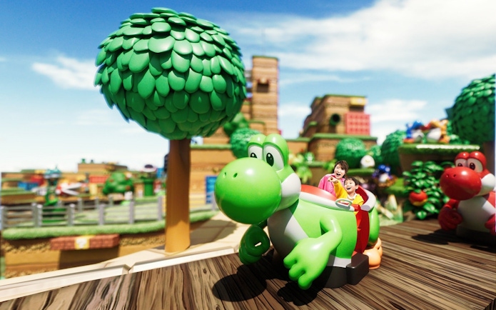 Visitors enjoying a Yoshi-themed ride at Universal Studios Japan.