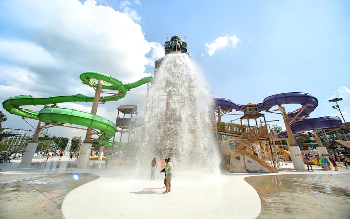 Water park with large slides and splash zone at Six Flags Over Georgia, Paradise Island.