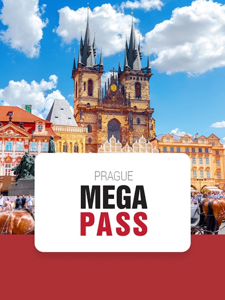 Old Town Square in Prague with Tyn Church and horse-drawn carriages.