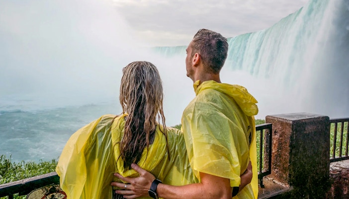 A couple at a viewpoint at Niagara Falls