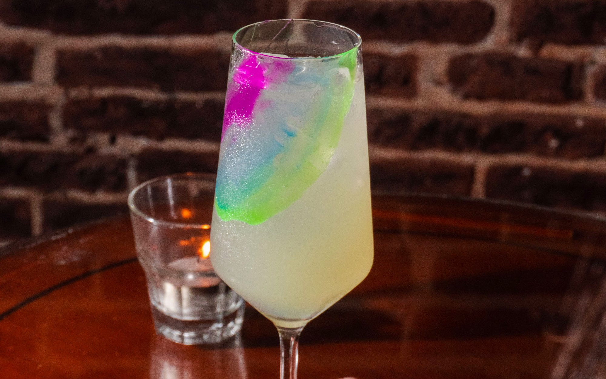 Cocktail with colorful garnish served at Michelangelo Tango Show.