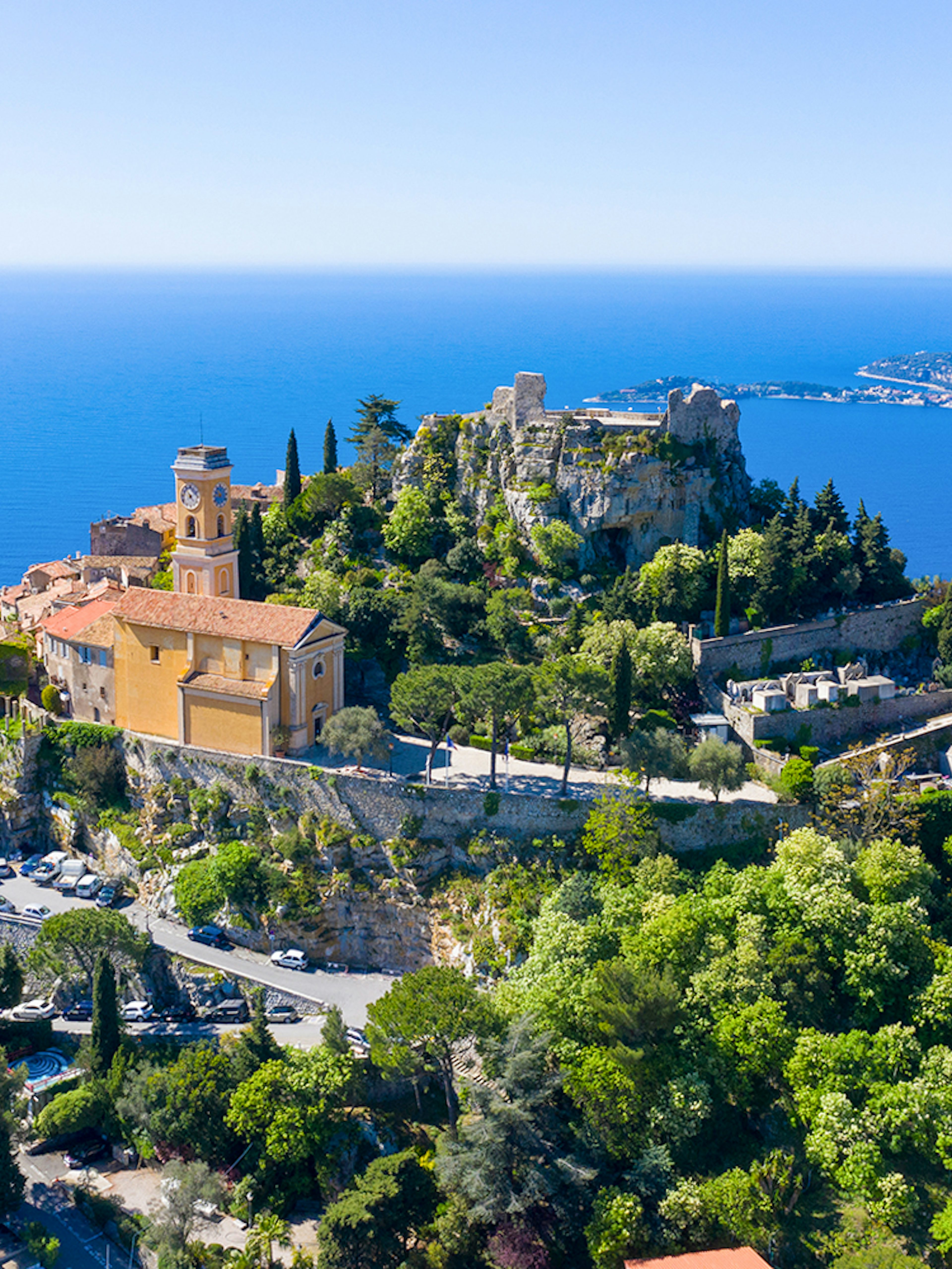 Aerial view of Èze village with Mediterranean Sea in the background.