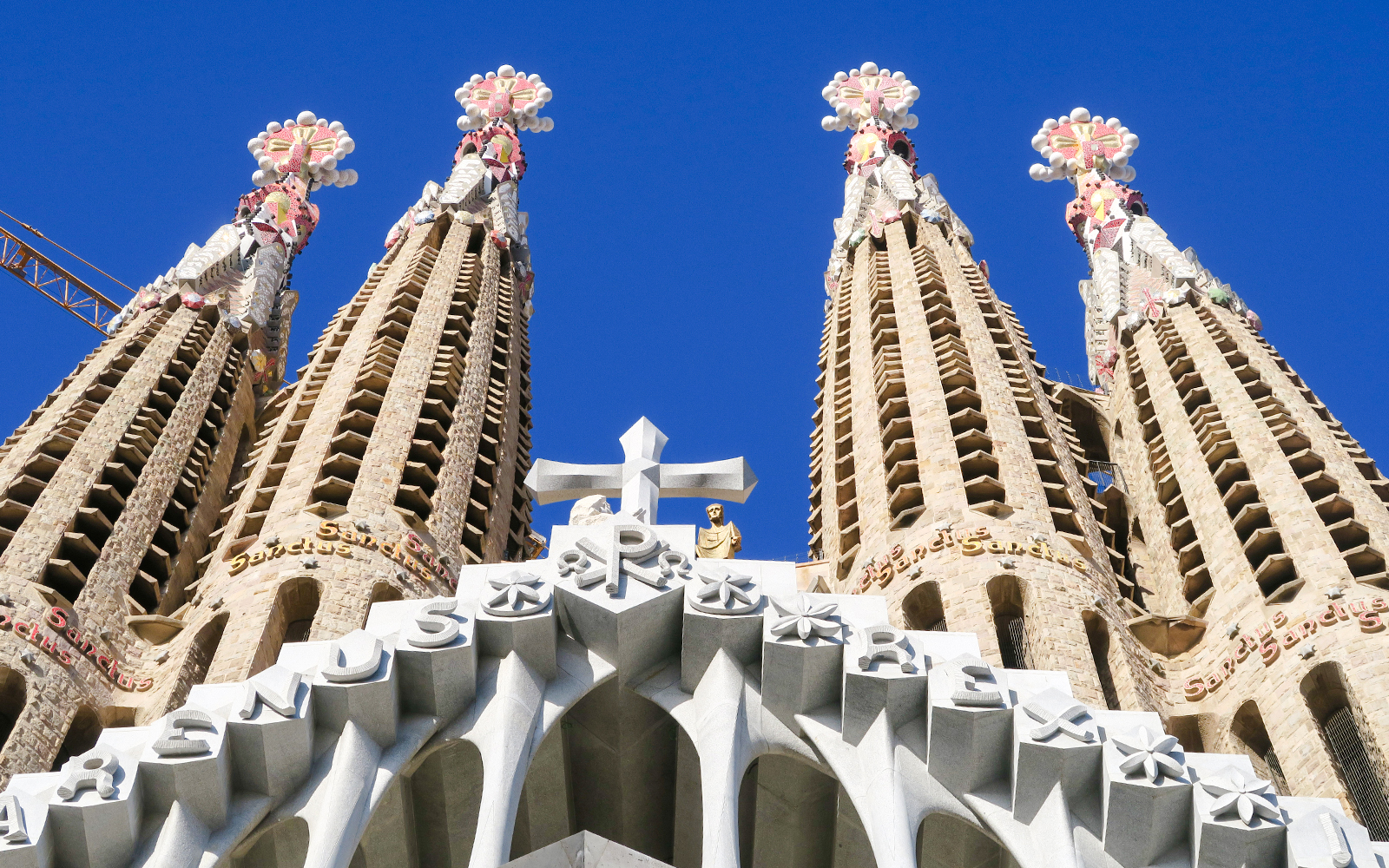 Towers of Sagrada Familia with intricate carvings, Barcelona.