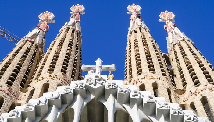Towers of Sagrada Familia with intricate carvings, Barcelona.