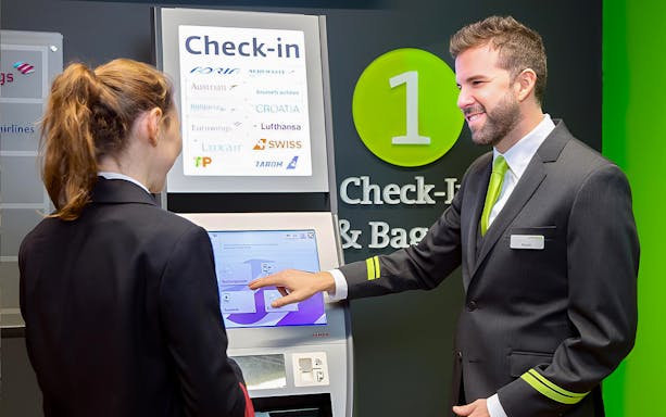Check-in kiosk at Vienna Airport for City Airport Train transfer.