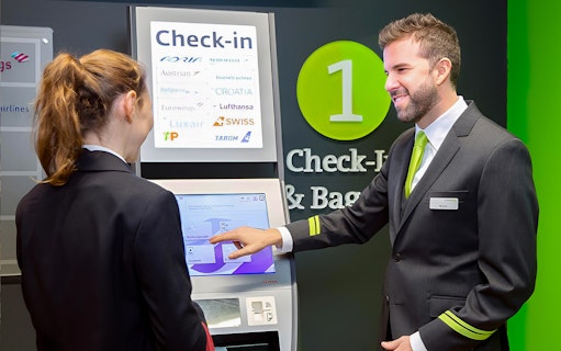 Check-in kiosk at Vienna Airport for City Airport Train tickets to Wien Mitte Station.