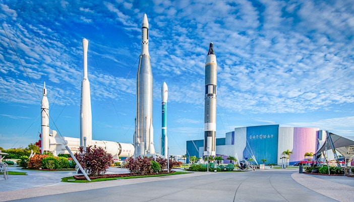 Kennedy Space Center exterior with displayed rockets, Cape Canaveral, Florida.