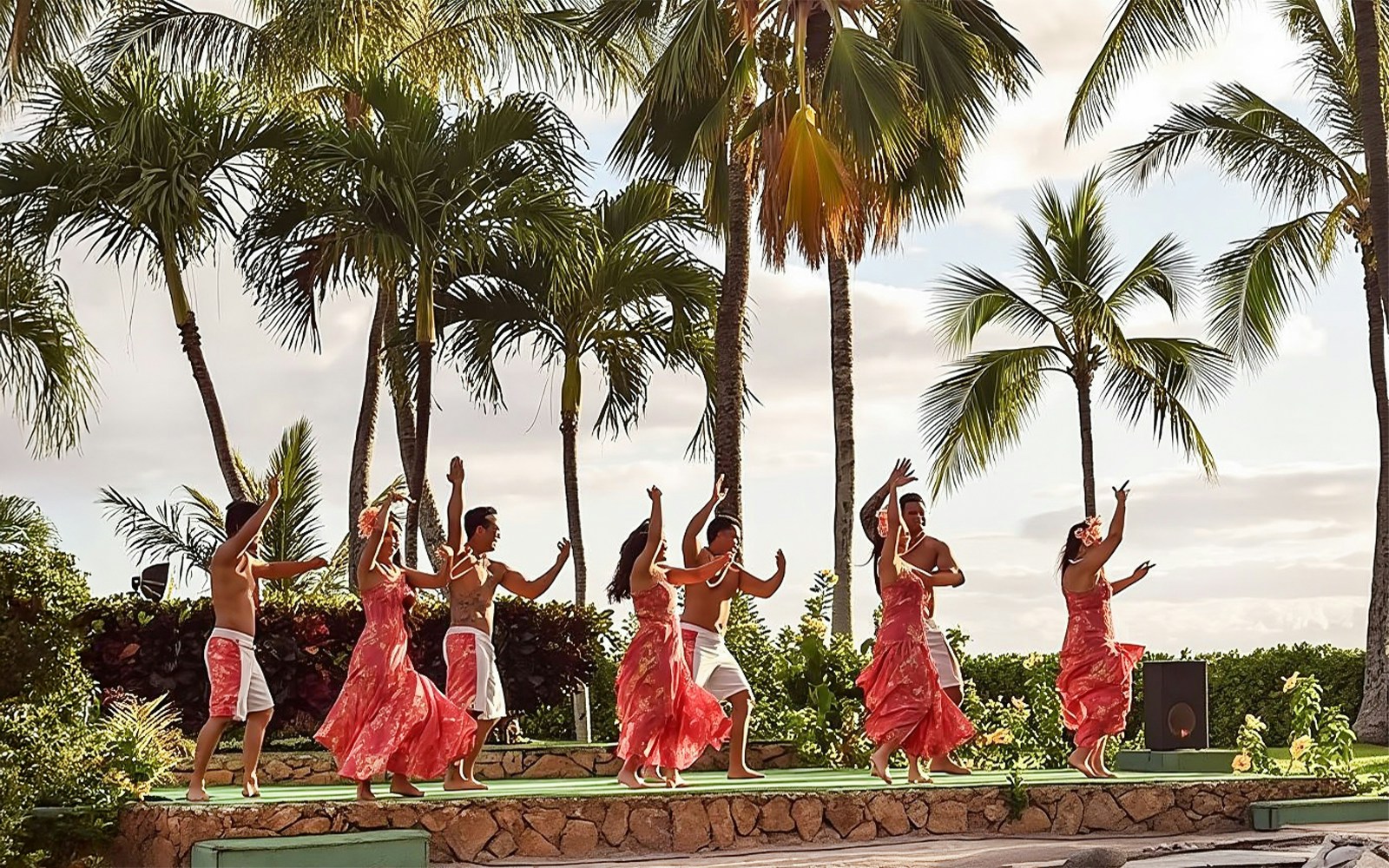 Dancers performing traditional Hawaiian hula at Paradise Cove Luau, Hawaii.