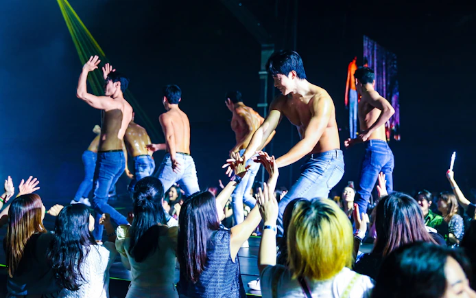 Performers interacting with audience at Wild Wild Show in Korea.