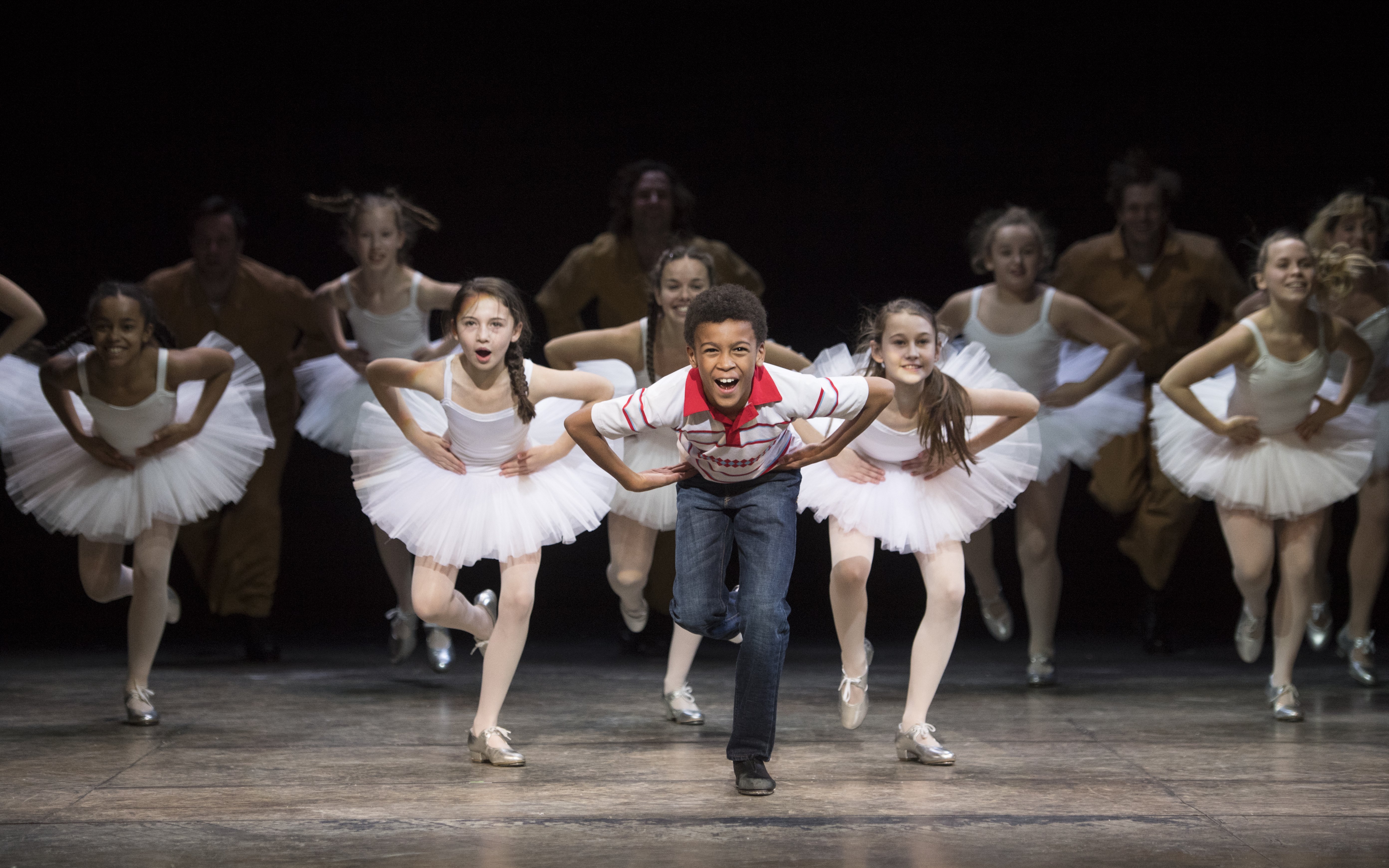 Children performing a dance scene in Billy Elliot the Musical, West End.