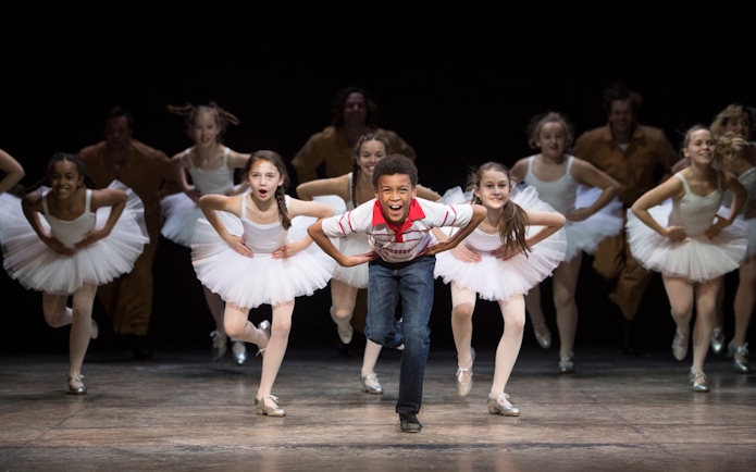 Children performing a dance scene in Billy Elliot the Musical, West End.