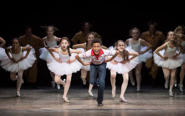 Children performing a dance scene in Billy Elliot the Musical, West End.