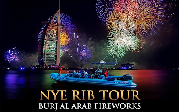 Speedboat on Dubai waters with Burj Al Arab fireworks during New Year’s Eve tour.