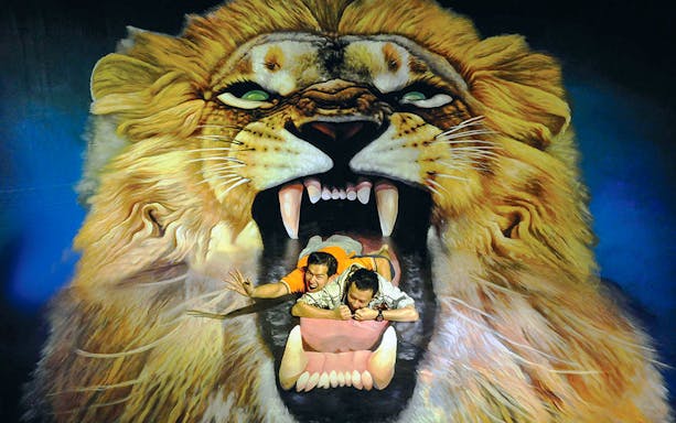 Visitors interacting with lion artwork at Alive 3D Art Gallery, Port Dickson.