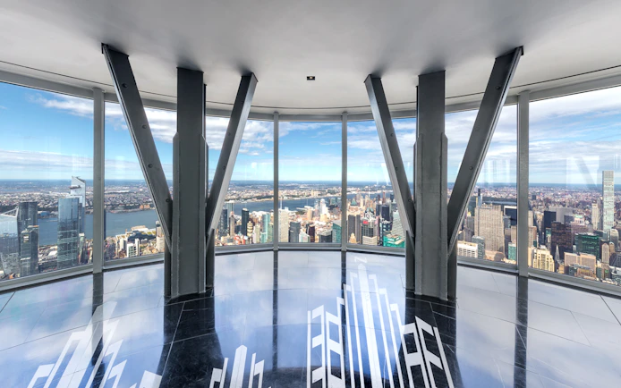 Empire State Building Observatory view of New York City skyline with Hudson River.