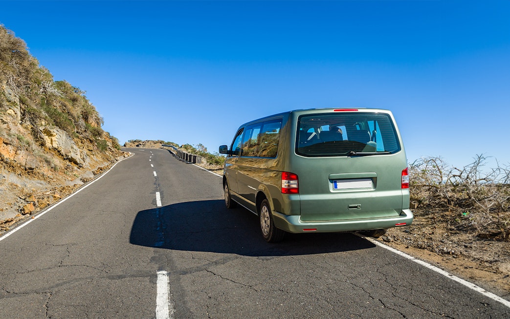Van on a scenic road near Cinque Terre during a guided tour from Florence.