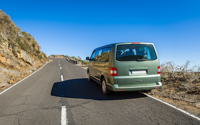 Van on a scenic road near Cinque Terre during a guided tour from Florence.