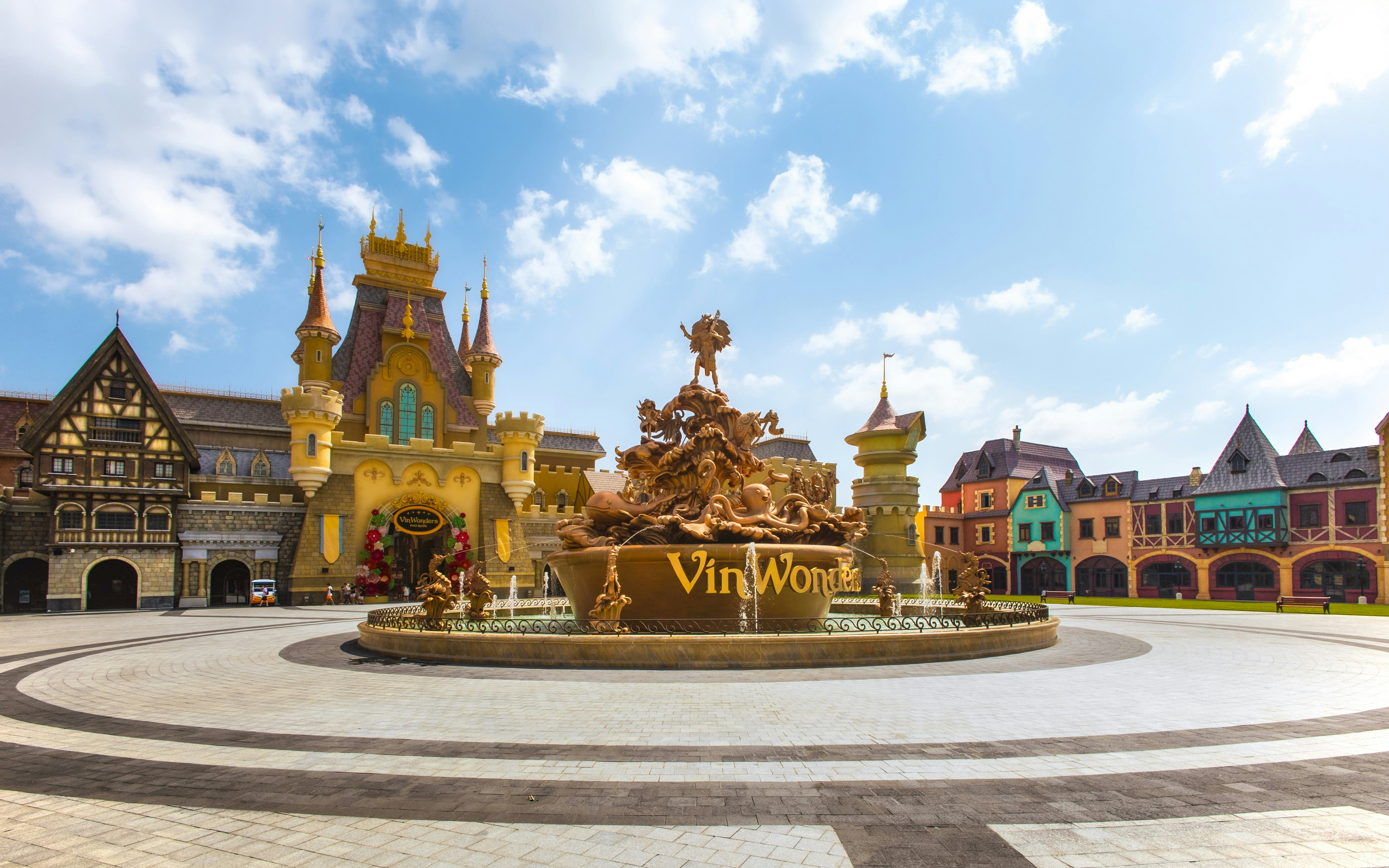 VinWonders Phu Quoc entrance with ornate fountain and castle-like architecture.