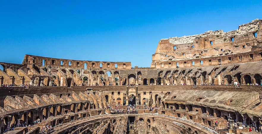Colosseum arena floor with view of gladiators' entrance in Rome, Italy.