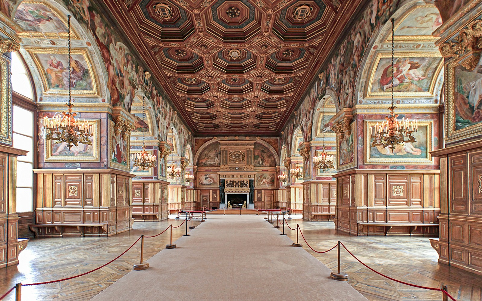 Chateau de Fontainebleau Royal Apartments Ballroom with ornate ceiling and chandeliers.