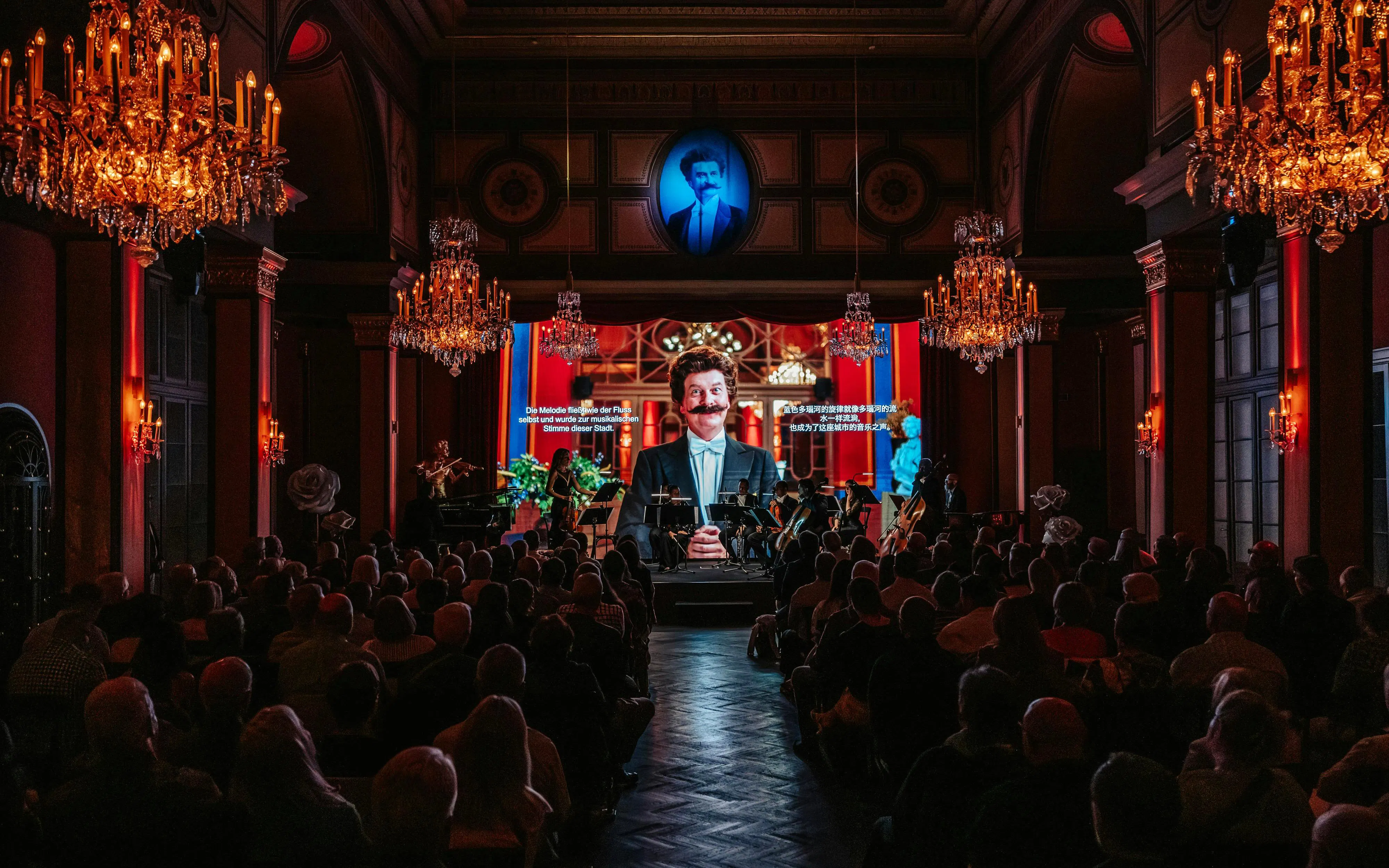 Classical concert in Vienna with musicians performing under chandeliers in an ornate hall.
