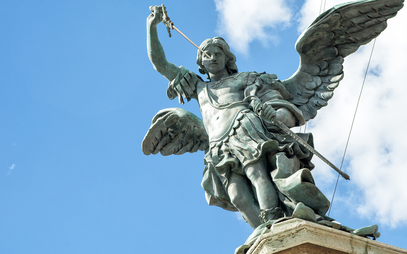 St Michael on top of Castel Sant`Angelo, Rome, Italy. Angel statue close-up.