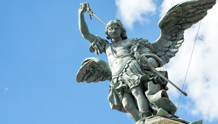 St Michael on top of Castel Sant`Angelo, Rome, Italy. Angel statue close-up.