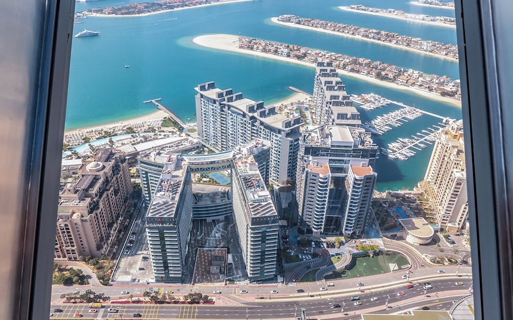 Aerial view of Palm Jumeirah and Dubai Marina from The View at The Palm.