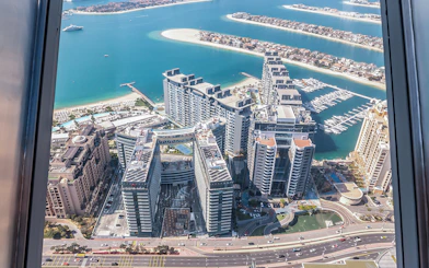 Aerial view of Palm Jumeirah and Dubai Marina from The View at The Palm.