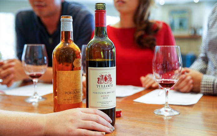 Tulloch Wines tasting with glasses and bottles at Hunter Valley experience.