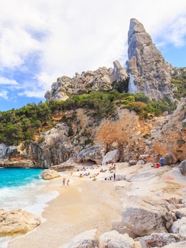 Cala Goloritze beach with limestone cliffs and turquoise water, Sardinia, Italy.