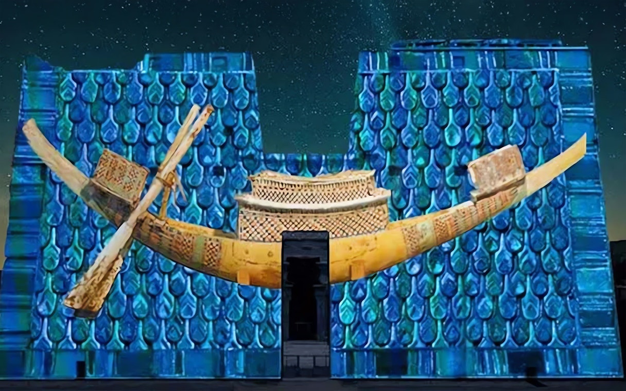 Projection of ancient Egyptian boat on Edfu Temple during Sound and Light Show.