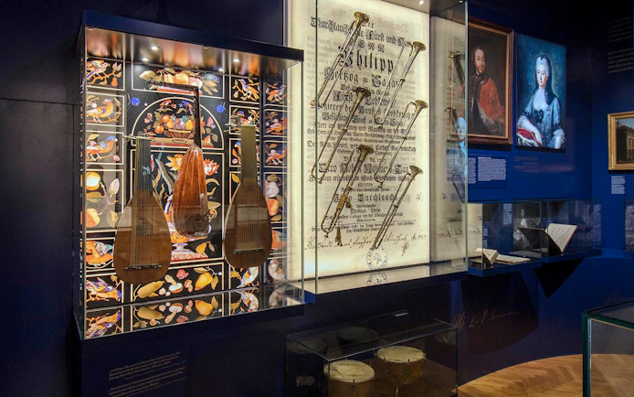 Musical instruments and historical documents on display at Lobkowicz Palace Museum, Prague Castle.