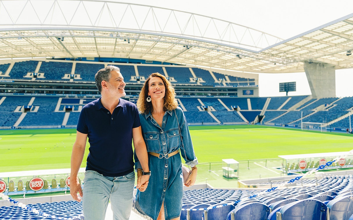 Visitors exploring the stands at FC Porto stadium museum.