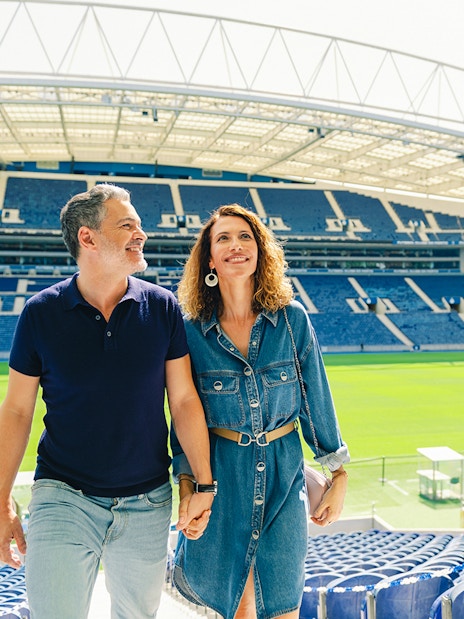Visitors exploring the stands at FC Porto stadium museum.