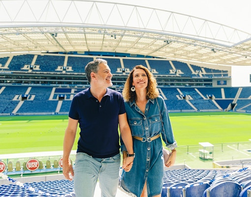 Visitors exploring FC Porto stadium museum stands.